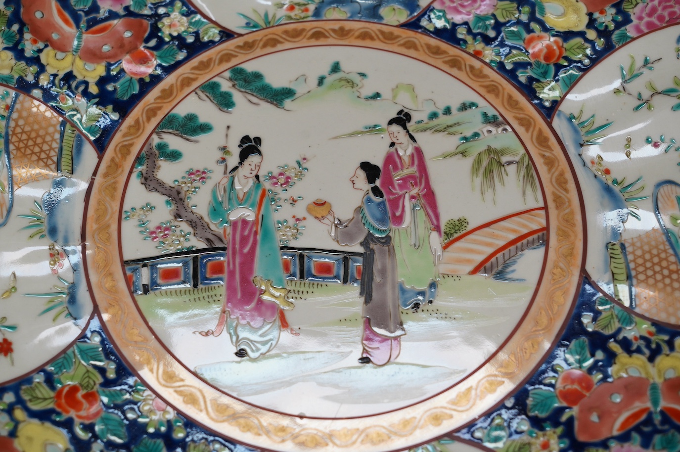 A Japanese famille rose charger, 40cm diameter. Condition - good, some wear